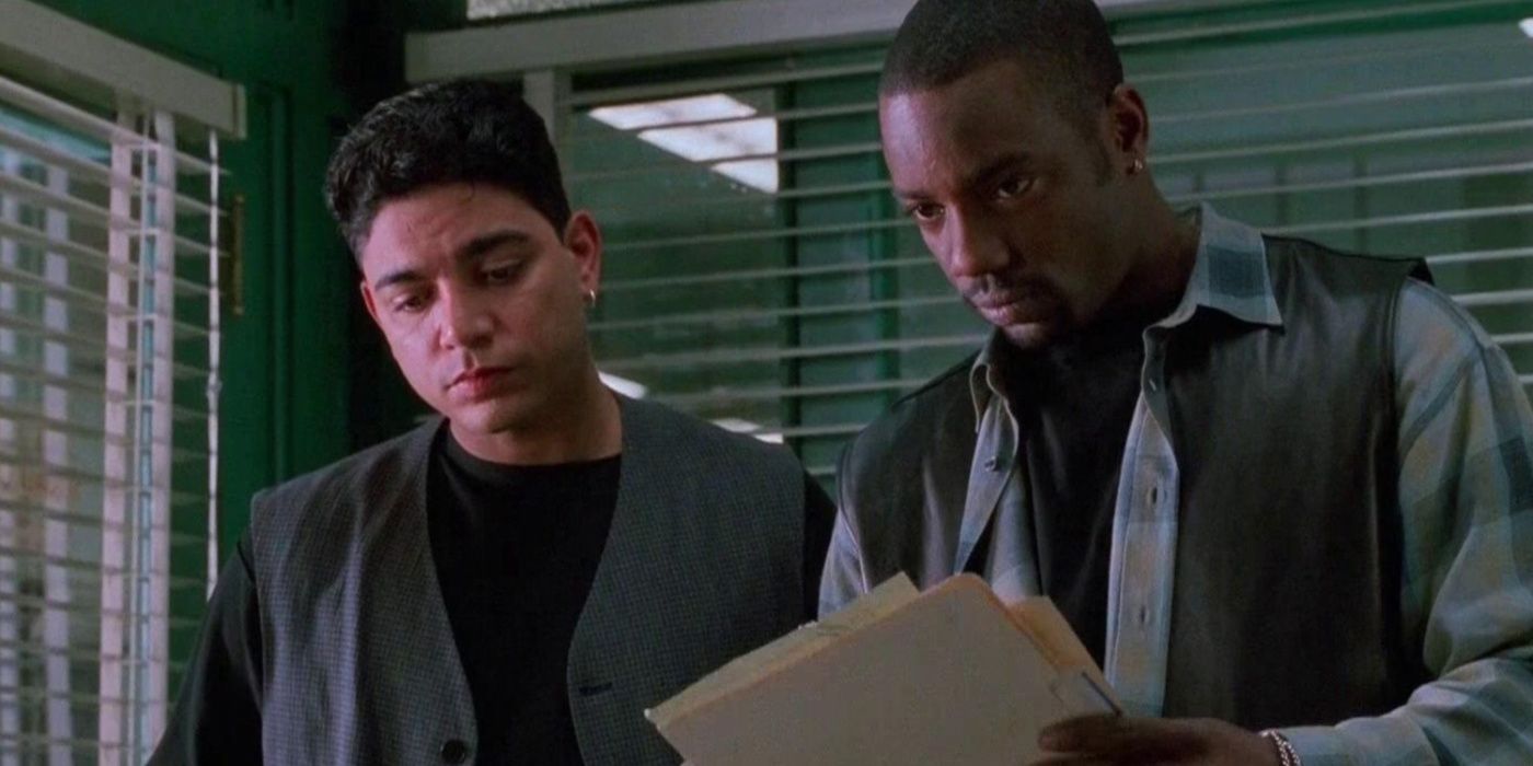 JC (Malik Yoba) and Eddie (Michael DeLorenzo) in an office in New York Undercover