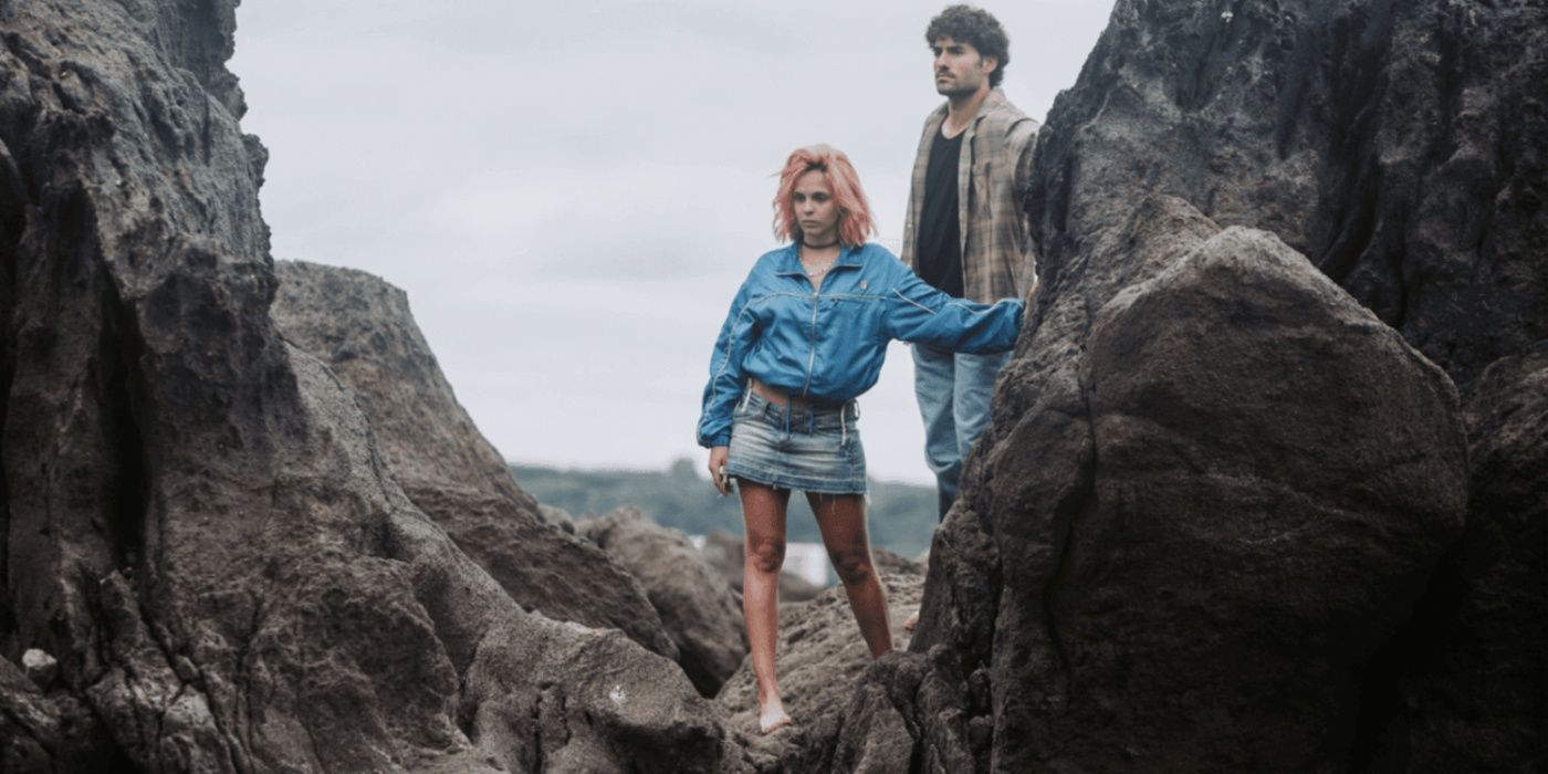 Eduardo and Silvia climb into a cave in Turn of the Tide