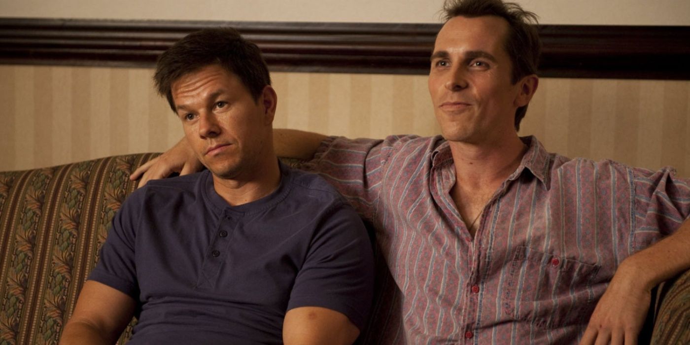 Dicky (Christian Bale) and Micky (Mark Wahlberg) on the couch in The Fighter