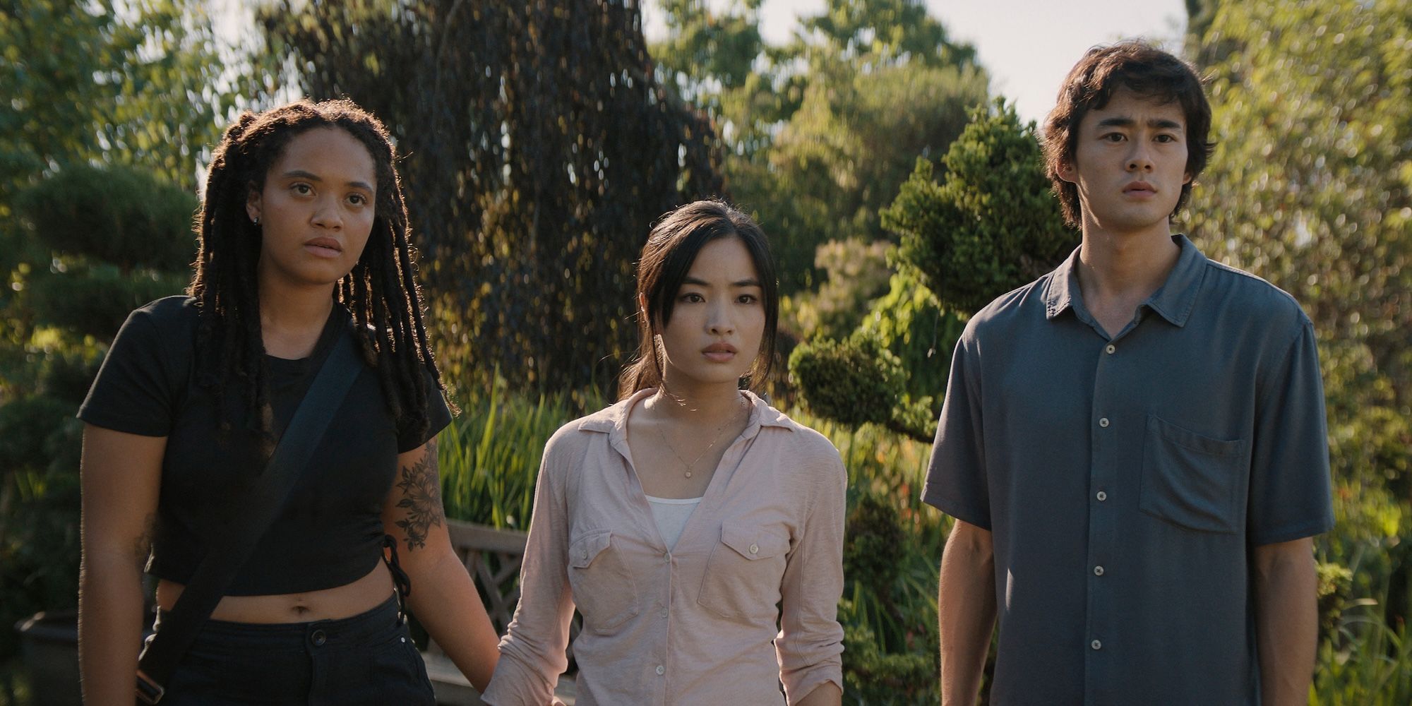 Kiersey Clemons, Ren Watabe and Anna Sawai standing next to each other in Monarch: Legacy of Monsters