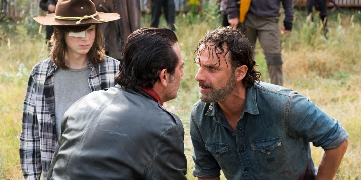 Negan and Rick face off in front of Carl in The Walking Dead