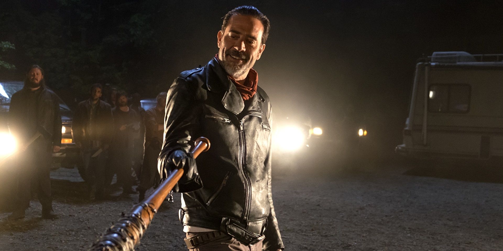 Negan smiling with a bat in The Walking Dead