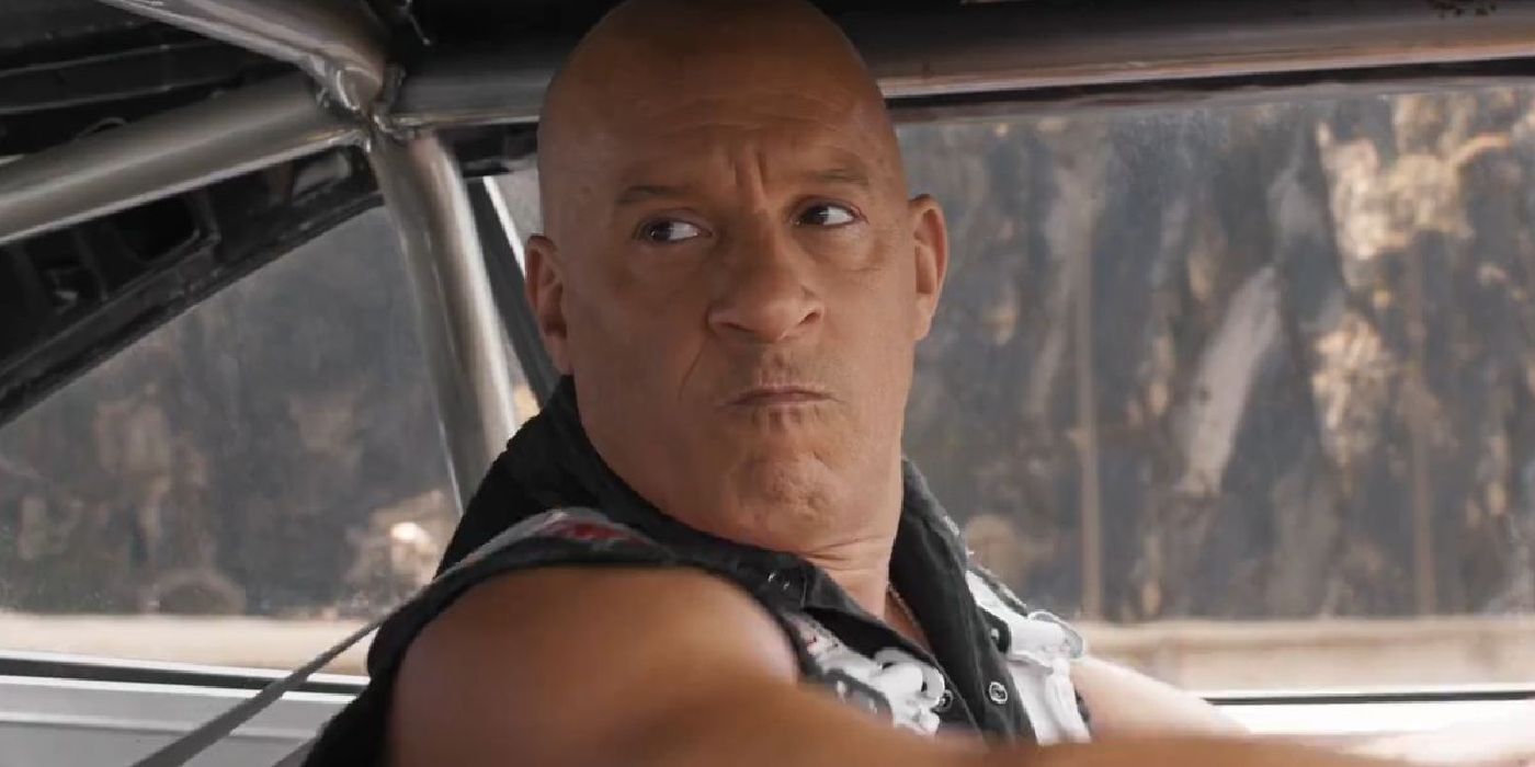 Vin Diesel as Dom looking worried inside his car in Fast X