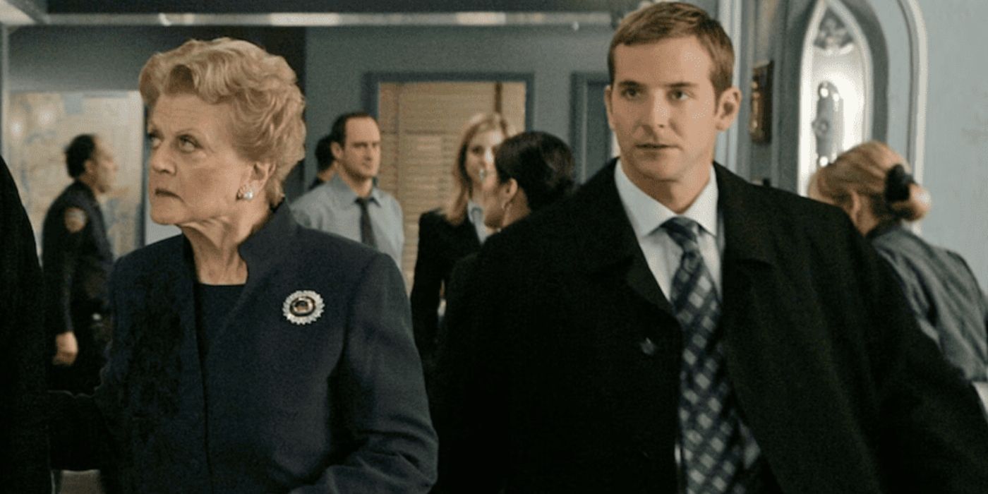 Angela Landsbury and Bradley Cooper walking down a hallway in Law & Order