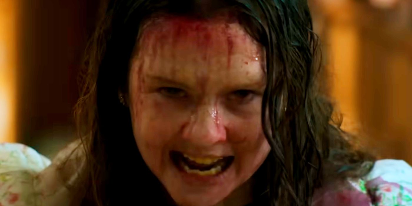 Olivia O’Neill as Katherine West Covered in Blood and Grimacing in Church in The Exorcist Believer