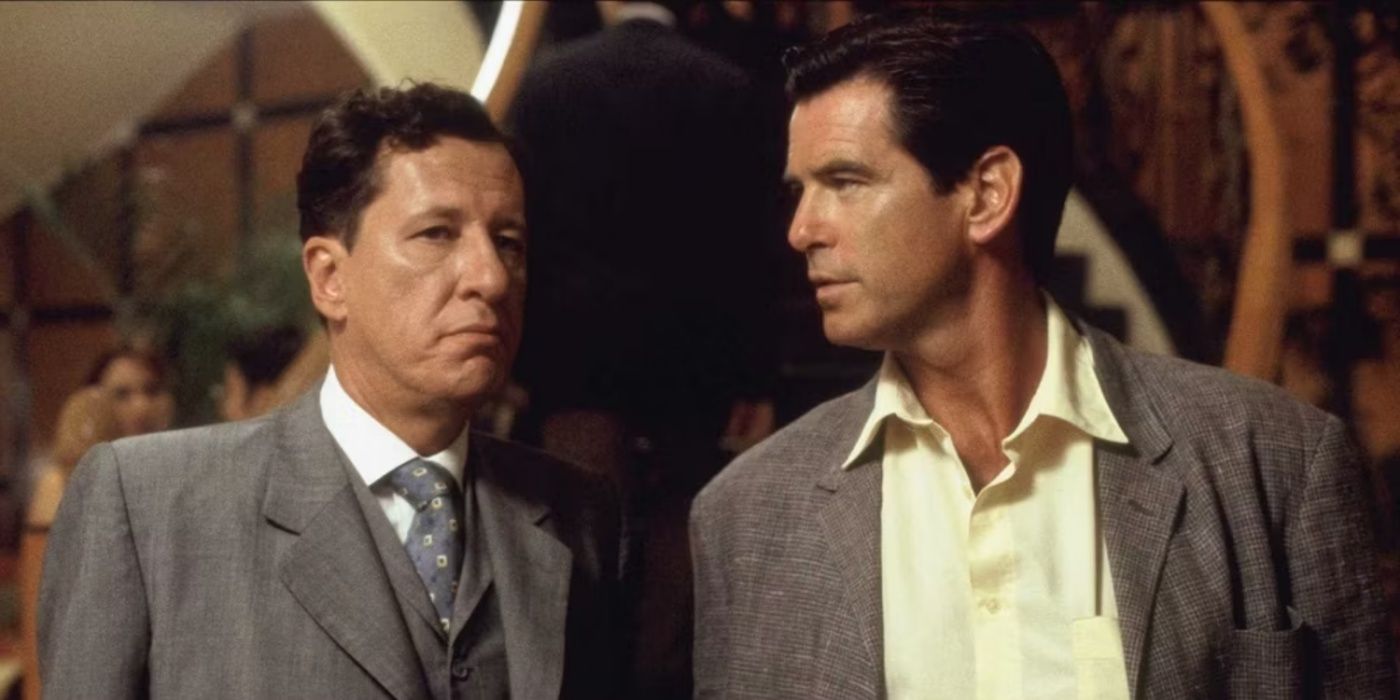 Pierce Brosnan standing next to Geoffrey Rush in The Tailor From Panama.