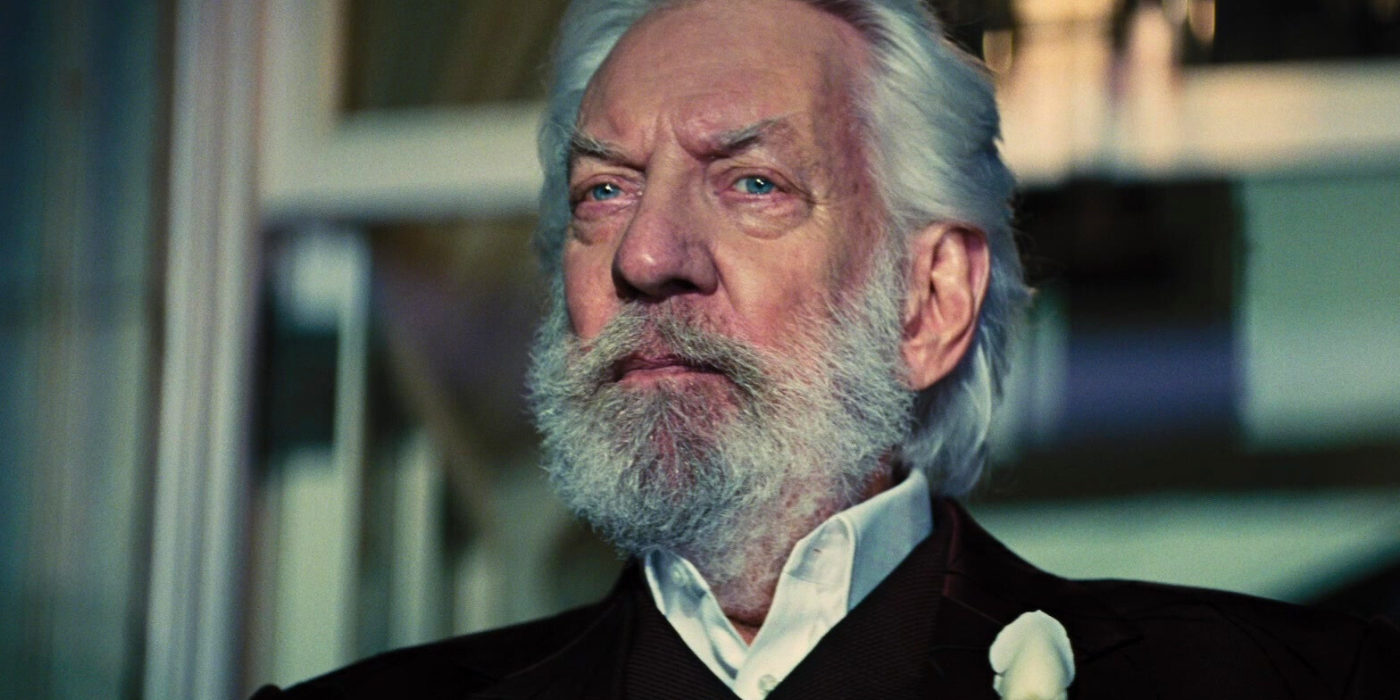 Donald Sutherland's President Coriolanus Snow at a Capitol party in The Hunger Games: Catching Fire
