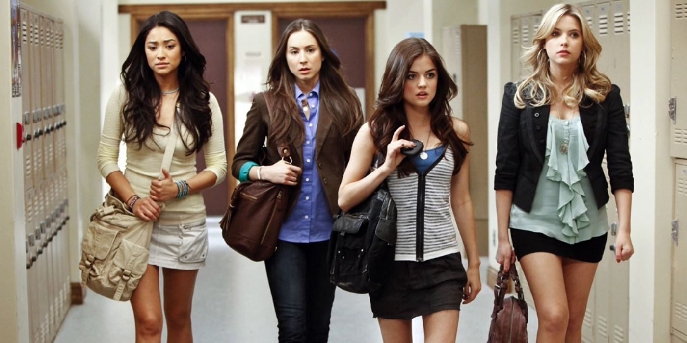 Emily, Spencer, Aria, and Hanna Walking Through the School Hallway in Pretty Little Liars Season 1