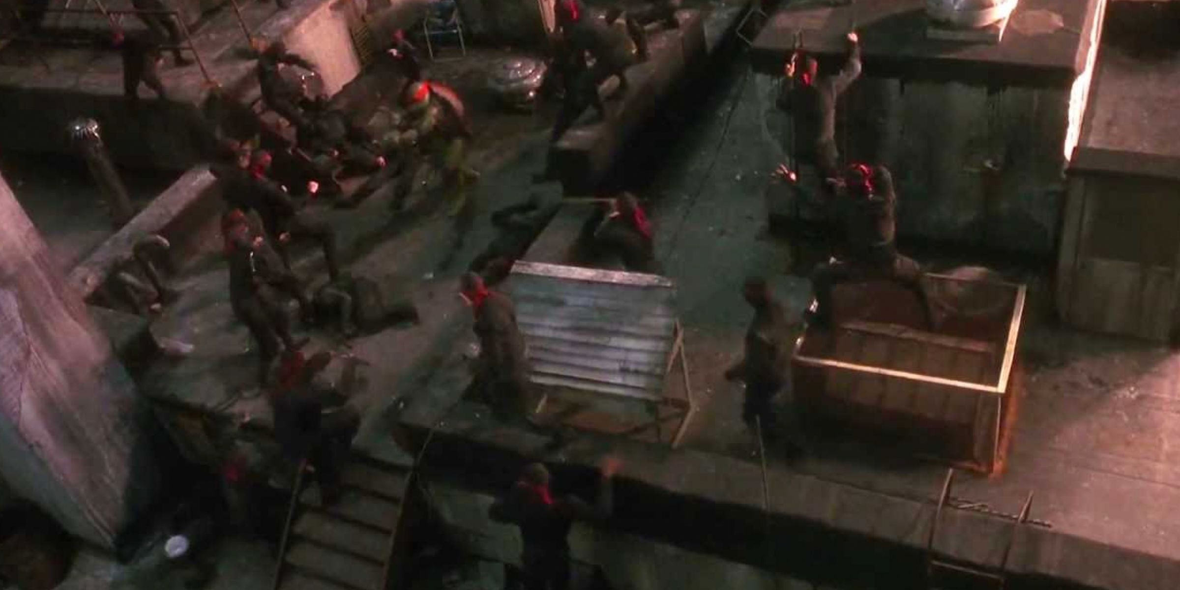 Raphael fights members of the Foot clan on the roof in Teenage Mutant Ninja Turtles