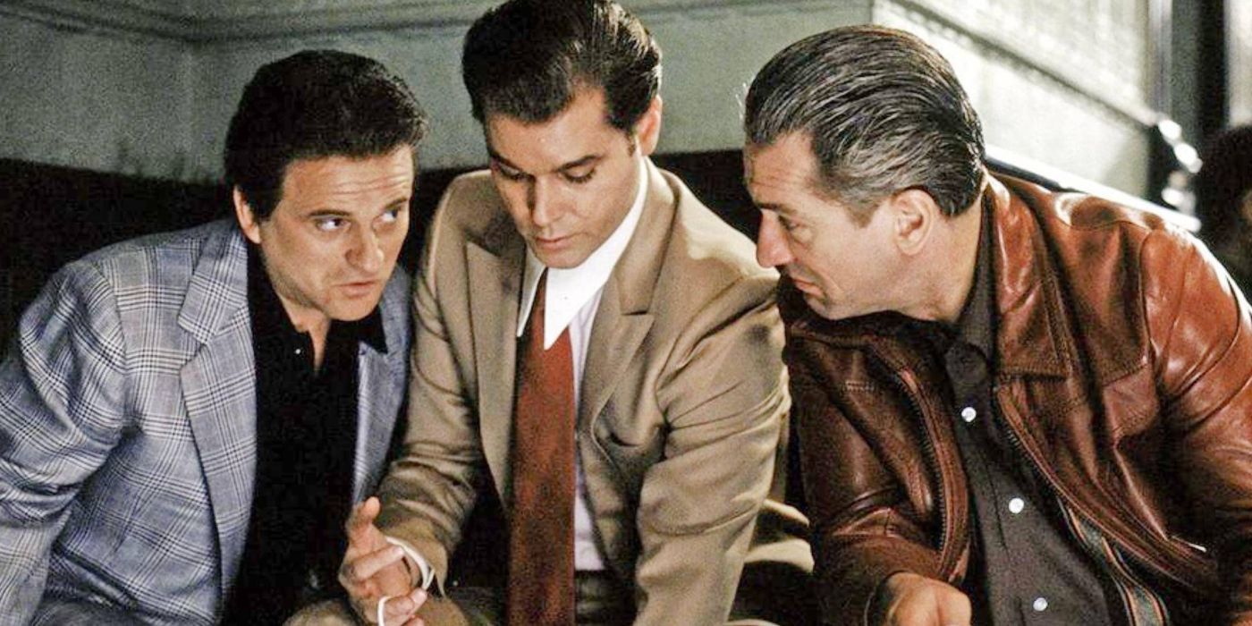 Ray Liotta, Joe Pesci and Rober DeNiro looking in a bag in Goodfellas