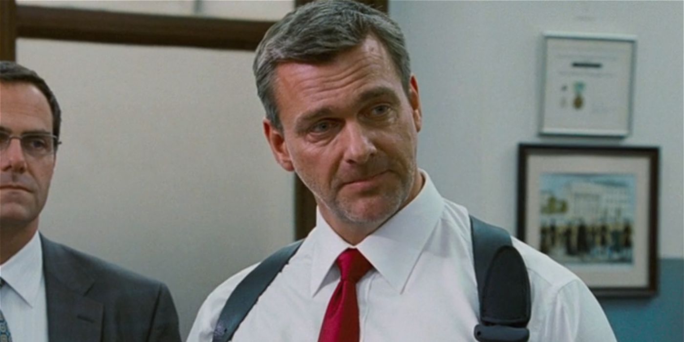 Ray Stevenson as Roger Wesley, looking off-camera in an office in The Other Guys.