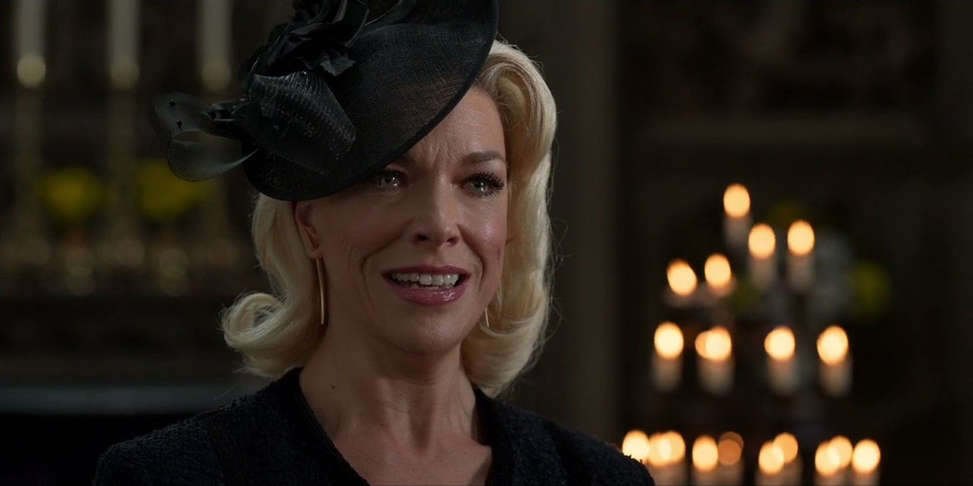 Rebecca smiling with tears in her eyes at her dad's funeral in Ted Lasso
