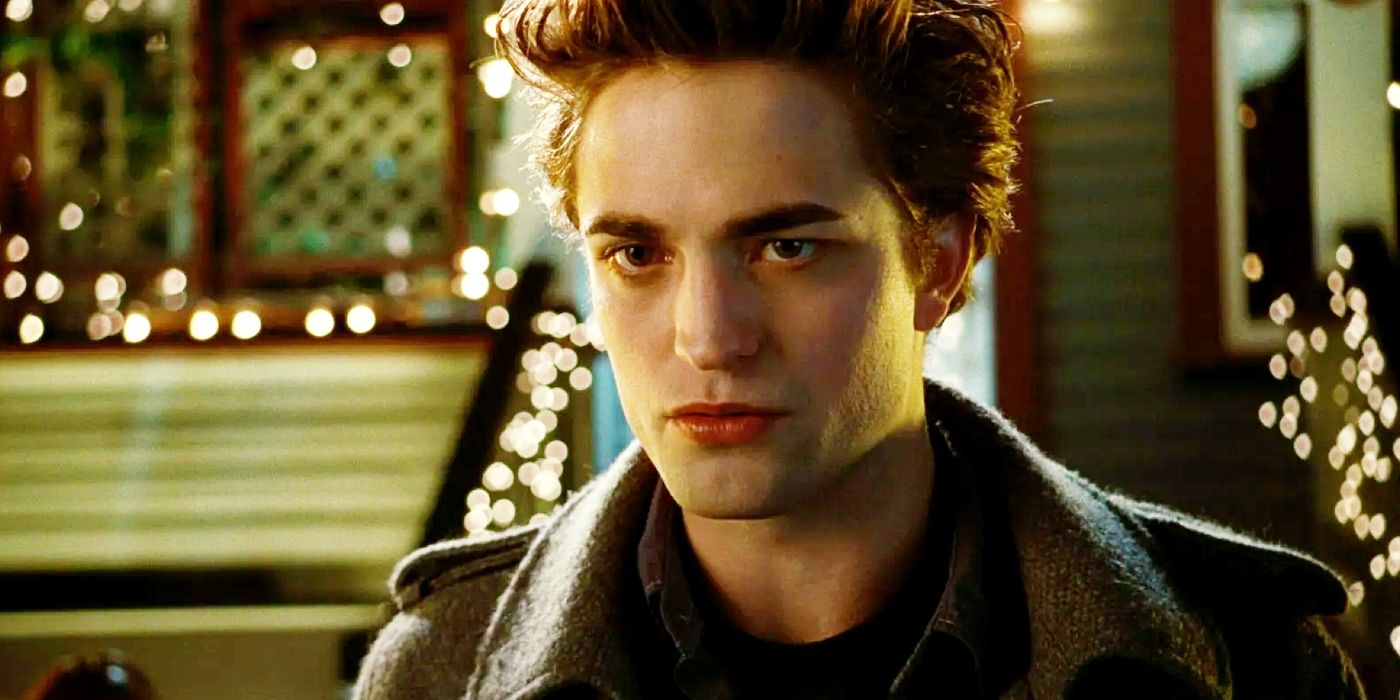 Robert Pattinson as Edward with Christmas lights behind him in Twilight.