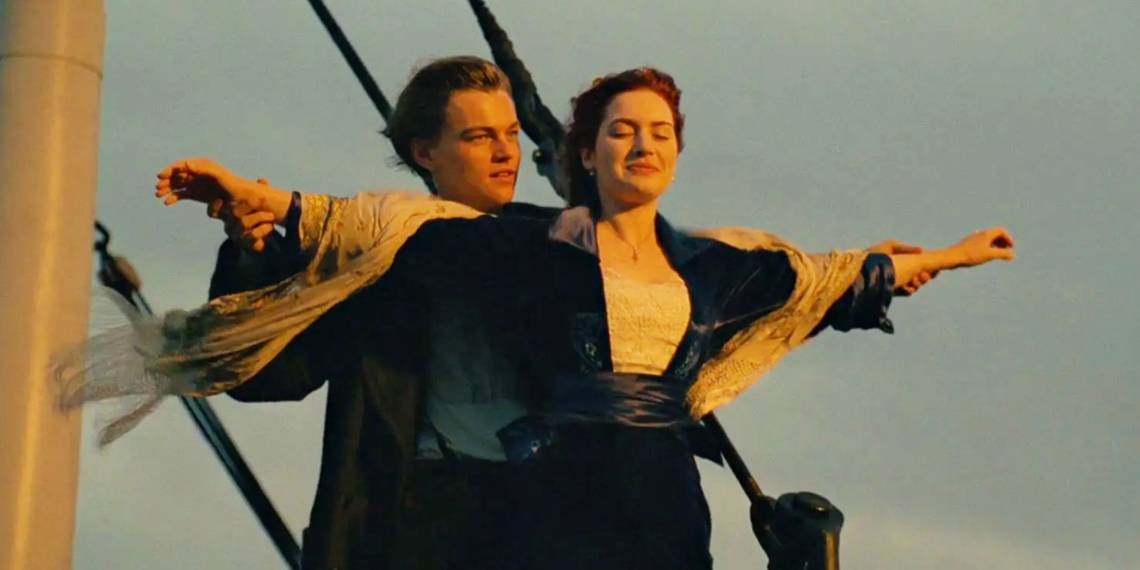 Jack and Rose hold each other on the prow of the Titanic