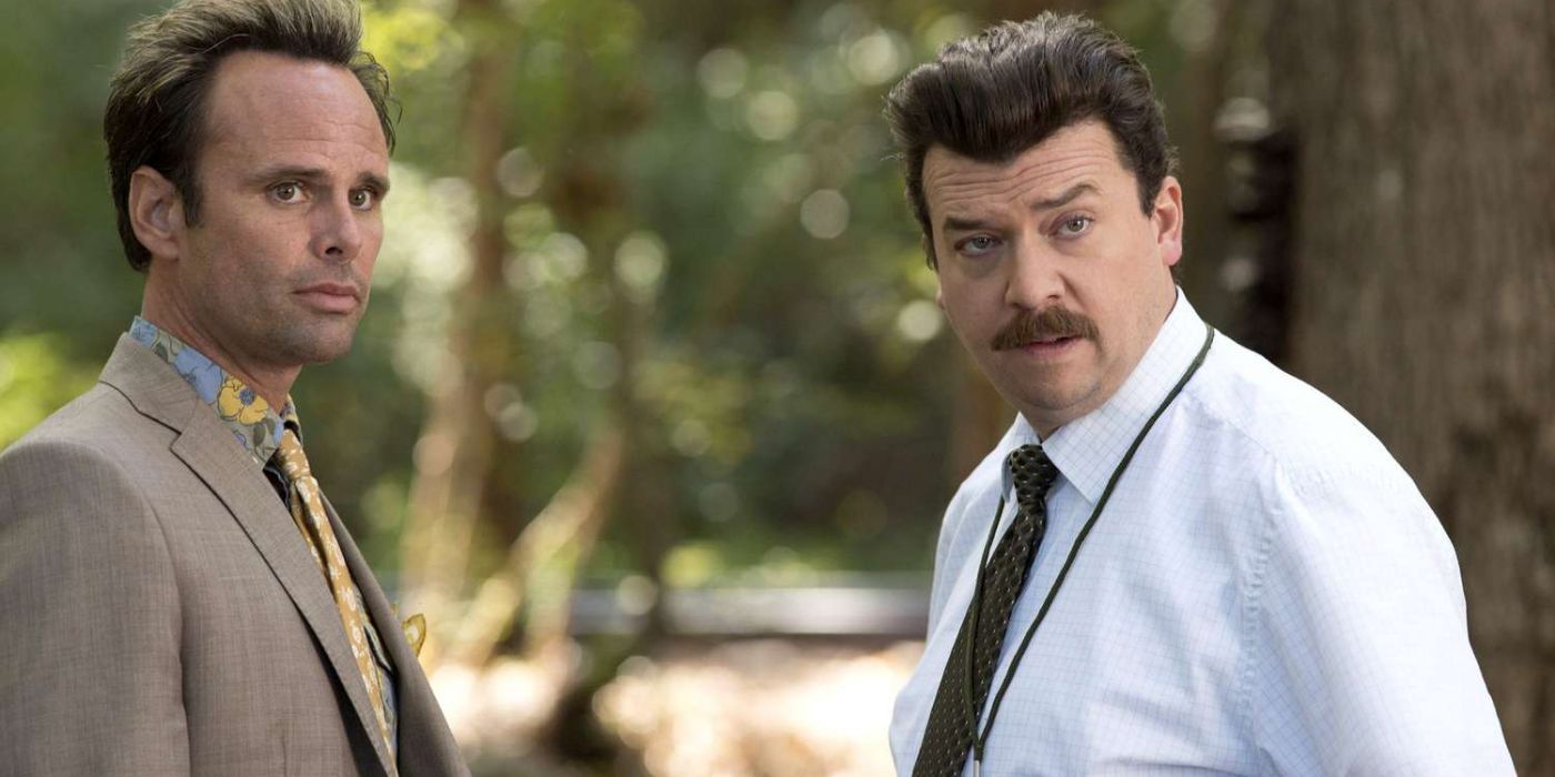 Russell and Gamby looking back at someone in the woods in Vice Principals.