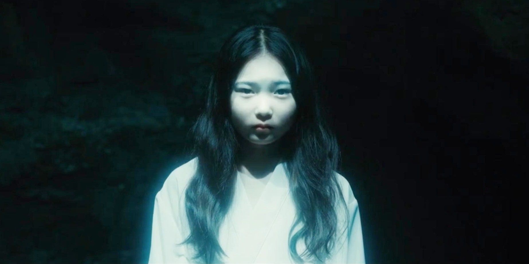 Sadako's glowing figure in The Ring's 2019 movie Sadako