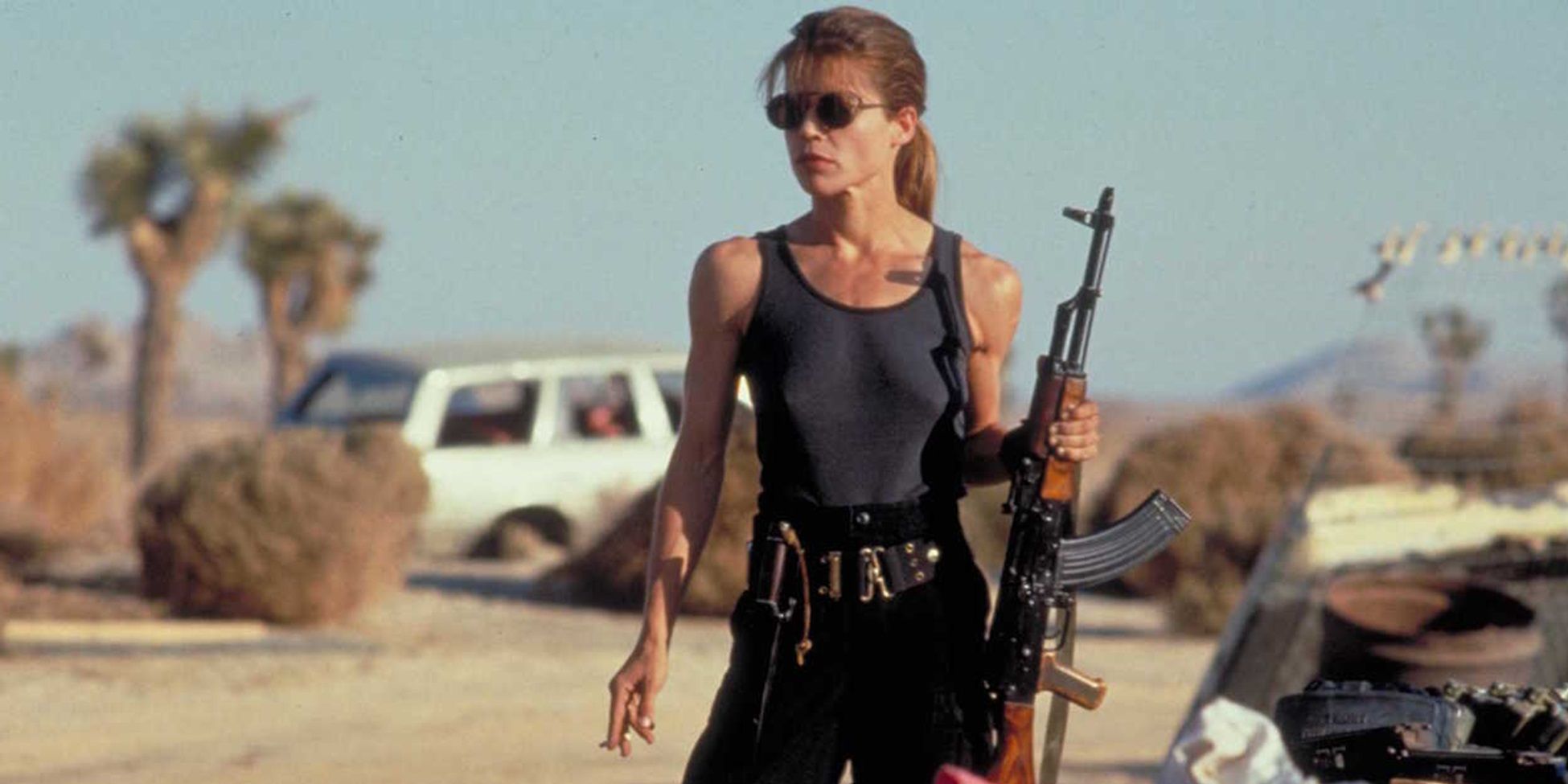 Linda Hamilton Sarah Connor in the desert with an assault rifle in Terminator 2 Judgment Day