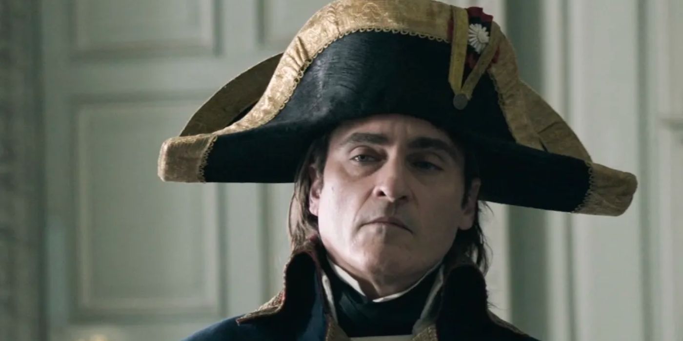 Joaquin Phoenix as Napoleon Bonaparte looking skeptical in Napoleon