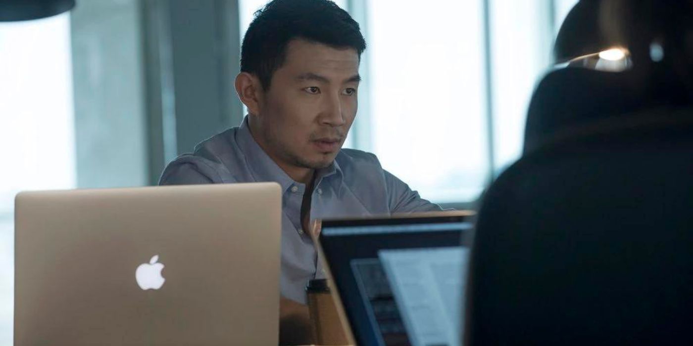 Simu Liu looking sideways in a scene from Taken