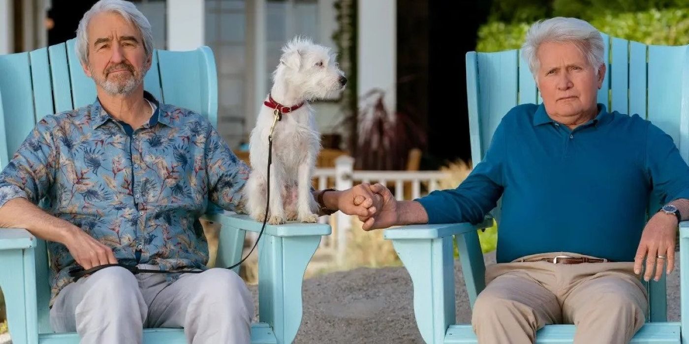 Sol (Sam Waterston) and Robert (Martin Sheen) with their dog, sitting in Adirondack chairs and holding hands in Grace and Frankie