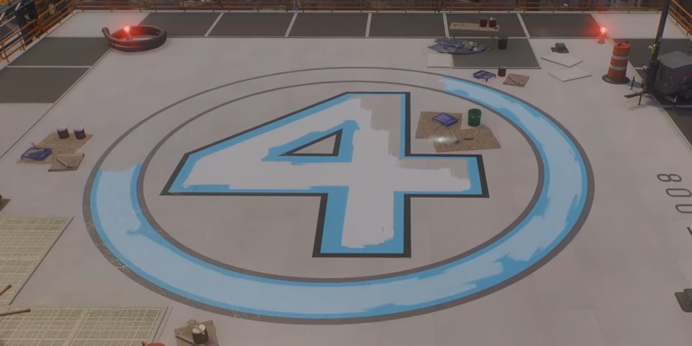 A partially painted Fantastic Four logo on the roof of a building in Marvel's Spider-Man 2.