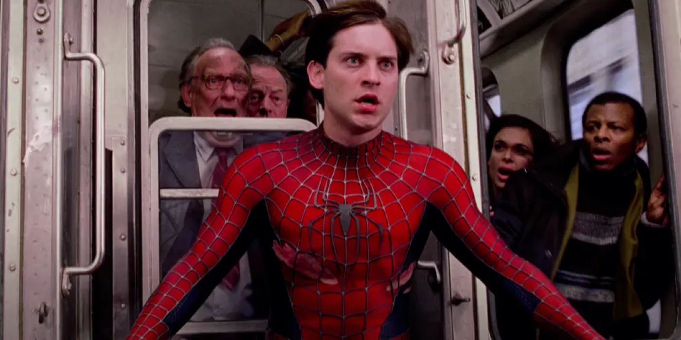 The train passengers looking at Tobey Maguire as Spider-Man in Spider-Man 2