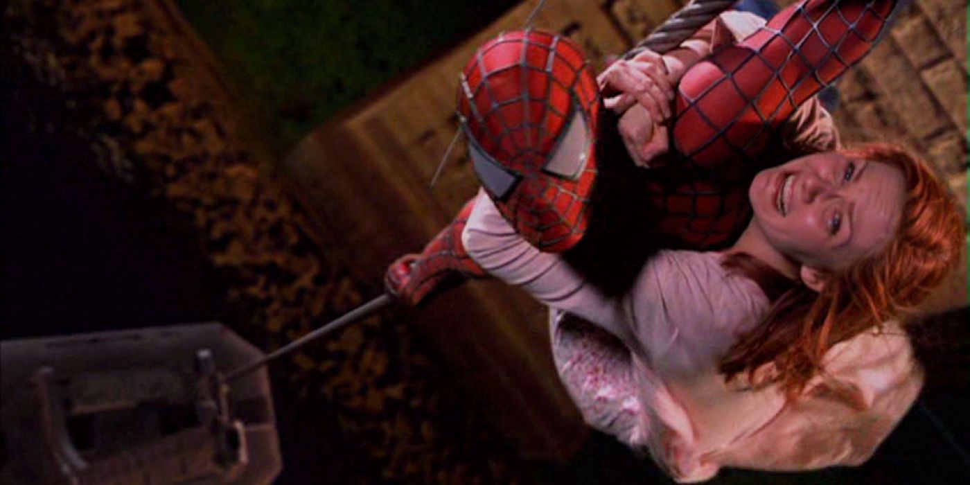 Tobey Maguir as Spider-Man saving Kirsten Dunst's MJ while holding a cable car in 2002's Spider-Man