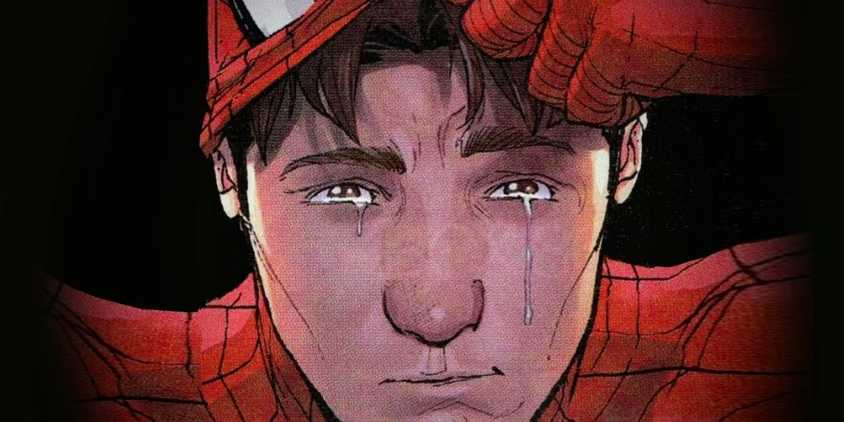 Peter Parker lifting his Spider-Man mask to reveal tears streaming from his eyes down his cheeks.