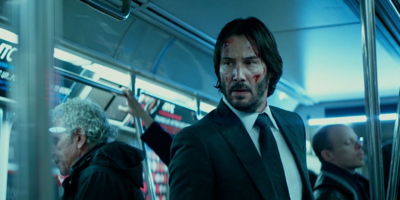 Keanu Reeves as John Wick on the New York subway