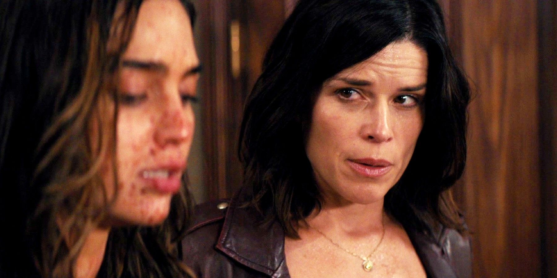 Neve Campbell's Sidney looks at Melissa Barerra's Sam in Scream 2022.