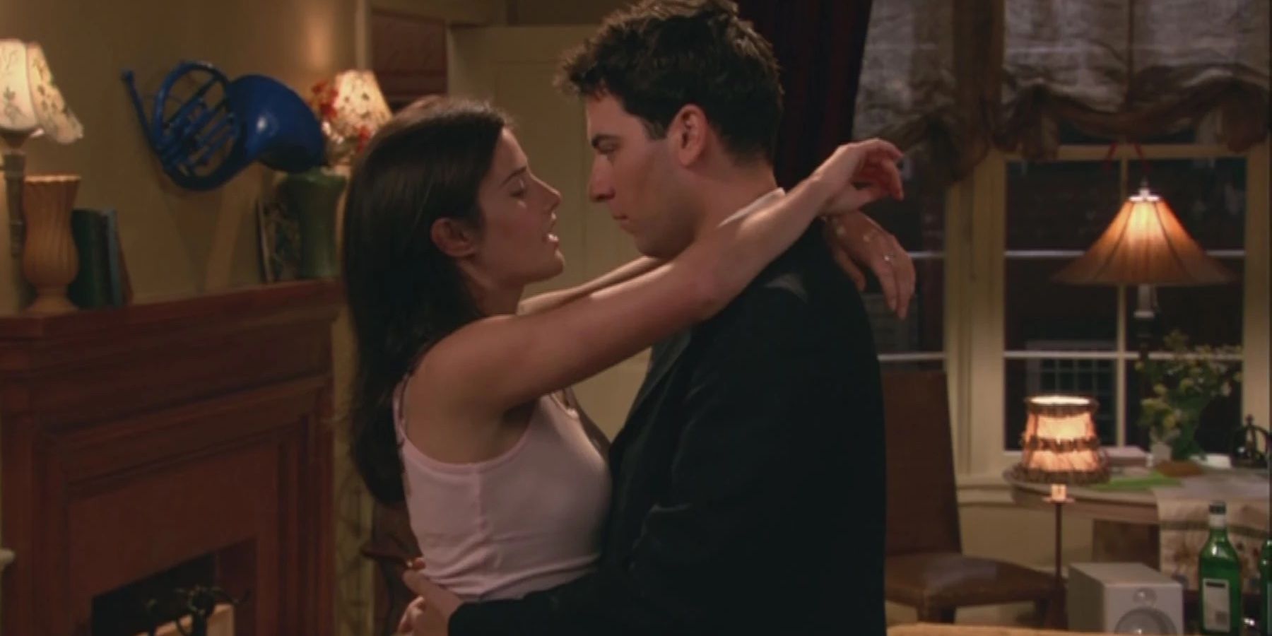 Cobie Smulders and Josh Radnor as Robin and Ted about to kiss in the How I Met Your Mother pilot episode