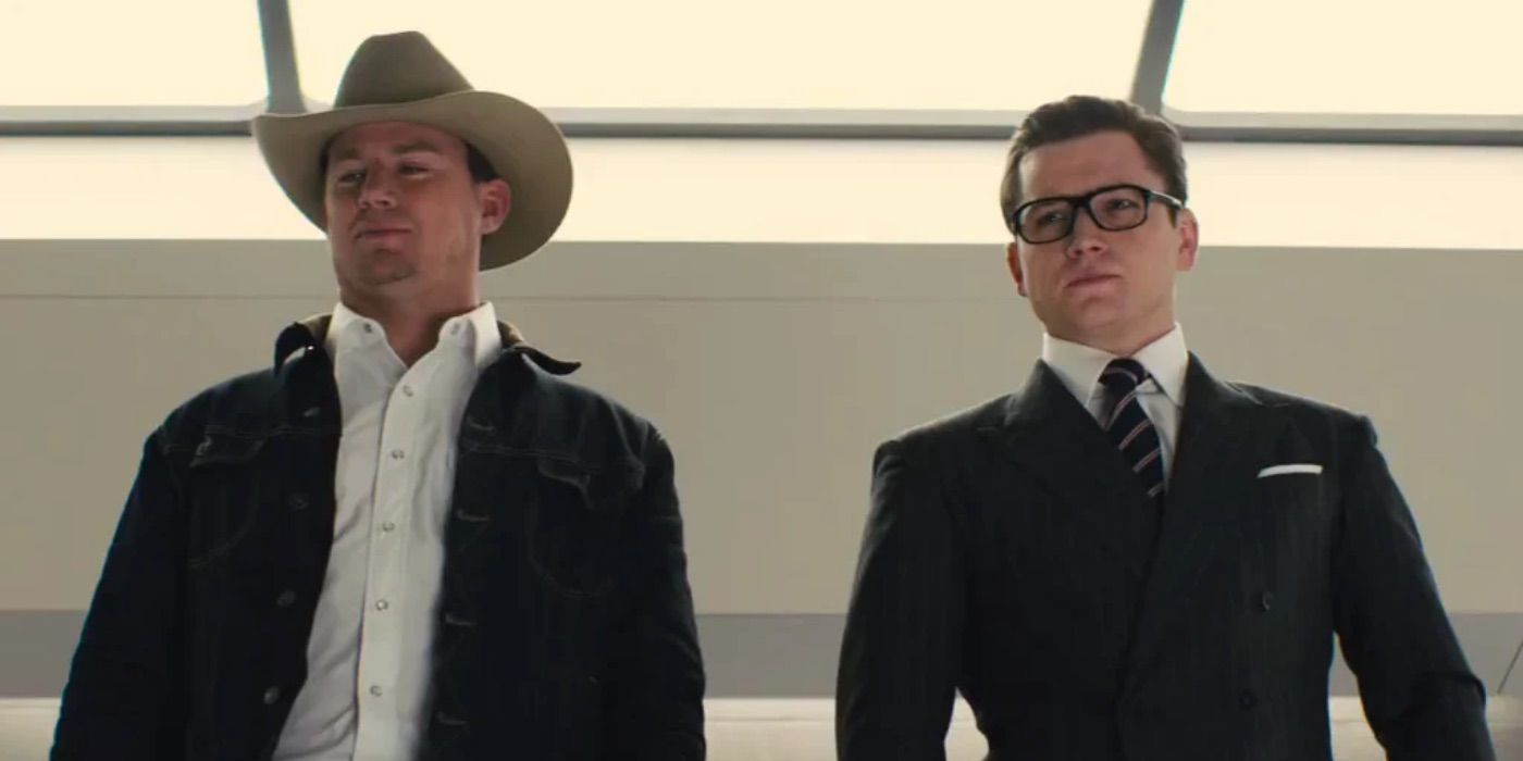 Tequila and Eggsy look down at something in Kingsman 