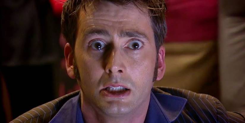 The Tenth Doctor looking scared, eyes full of tears, on the Midnight train in the Doctor Who season 4 episode "Midnight."