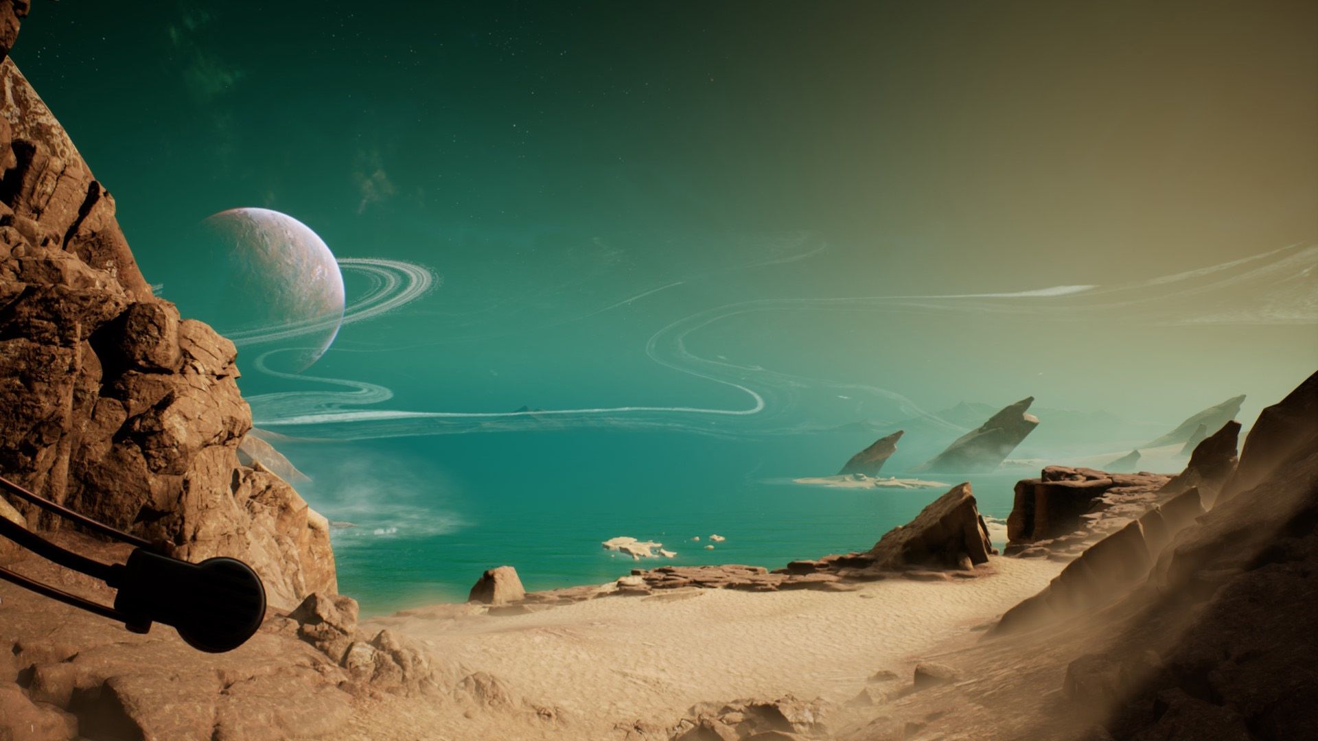 A ringed planet visible in a turquoise sky over a planetary landscape.