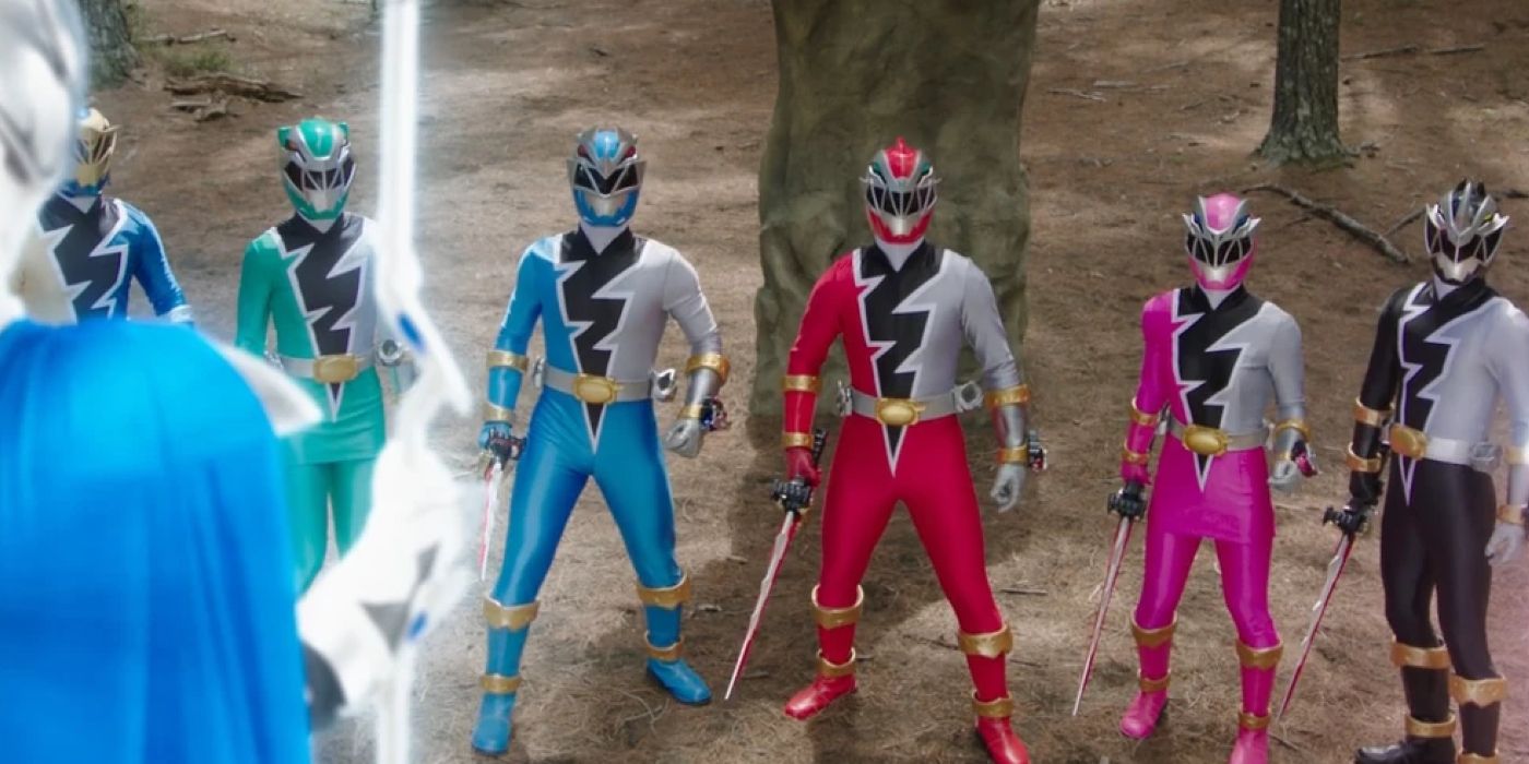 The original Dino Fury Power Rangers looking at the Blue Morphin Master