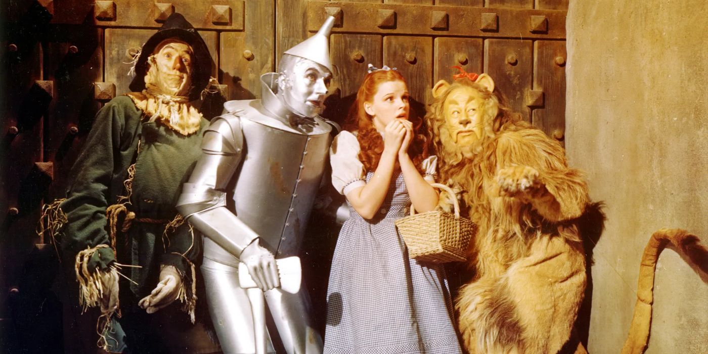 The Scarecrow, Tinman, Dorothy, and Lion looking scared in The Wizard of Oz