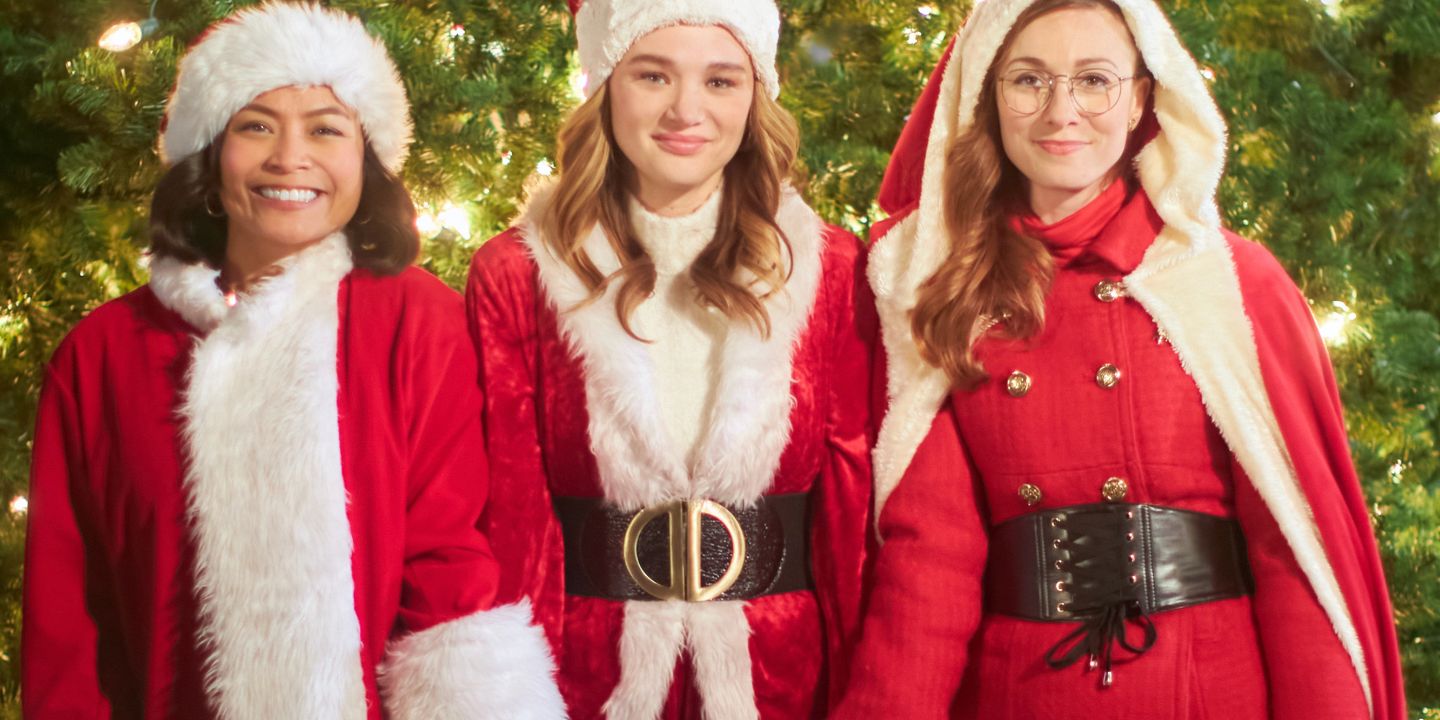Three women in Santa Suits for the Hallmark movie the Santa Summit