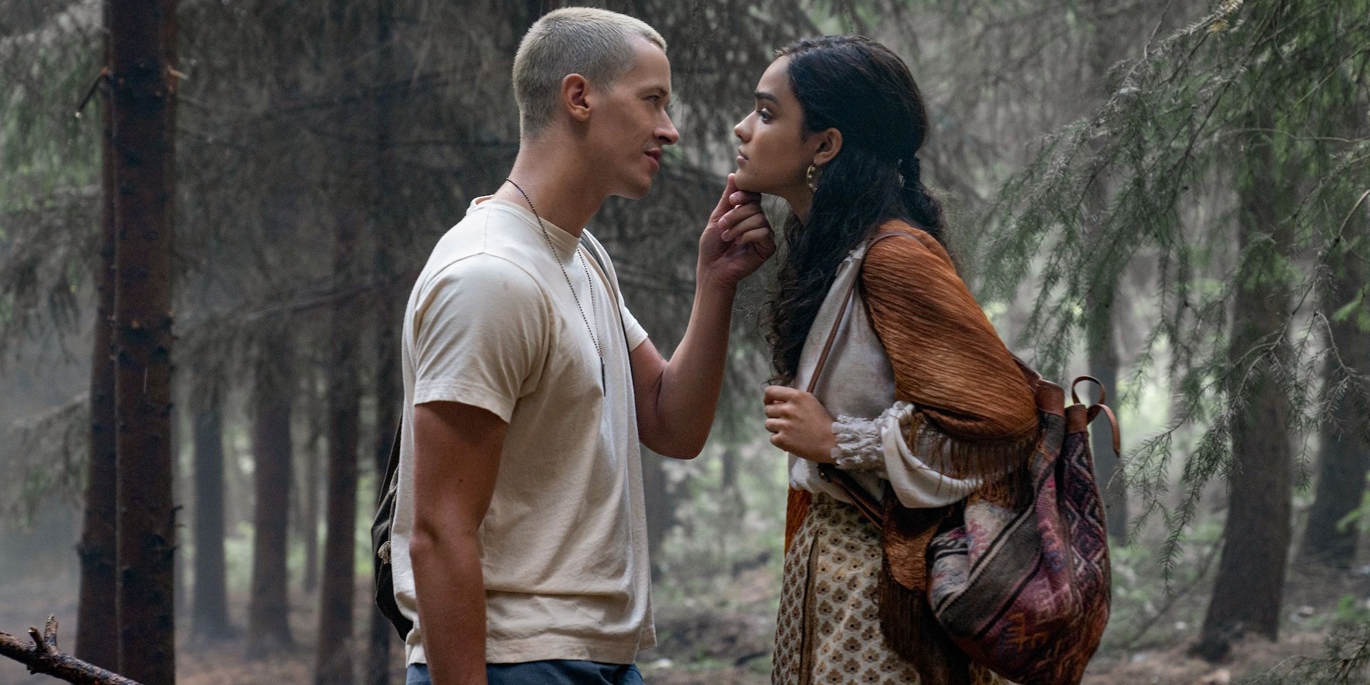 Coriolanus Snow and Lucy Gray Baird in the woods at the end of The Ballad Of Songbirds and Snakes