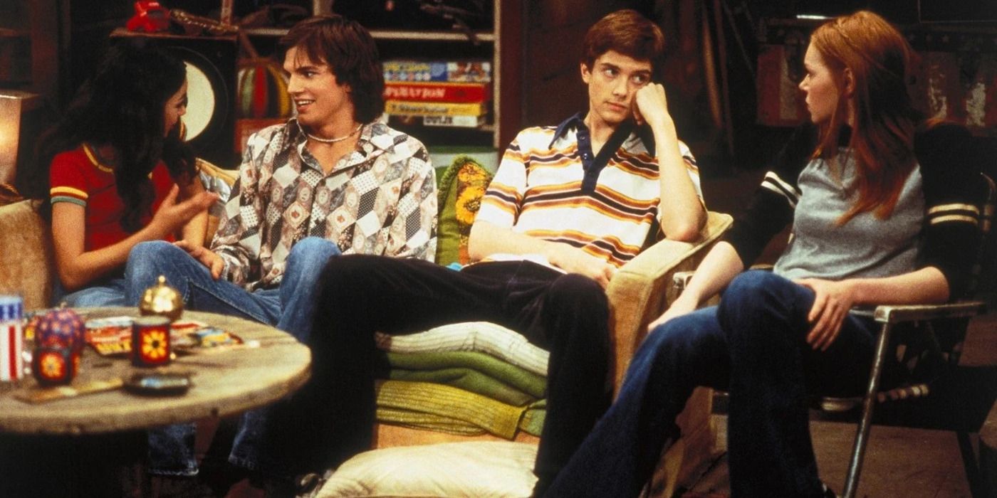 Jackie, Kelso, Eric, and Donna sitting in the basement in That '70s Show Pilot