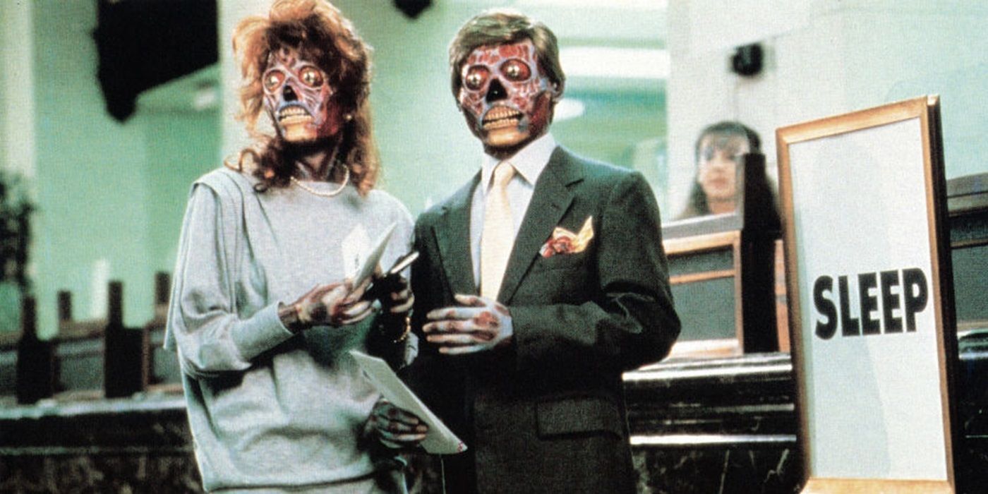 Two aliens linking arms in They Live