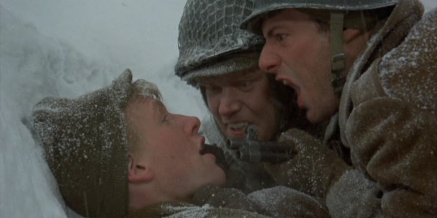 Two soldiers threatening another in the snow in Slaughterhouse-Five