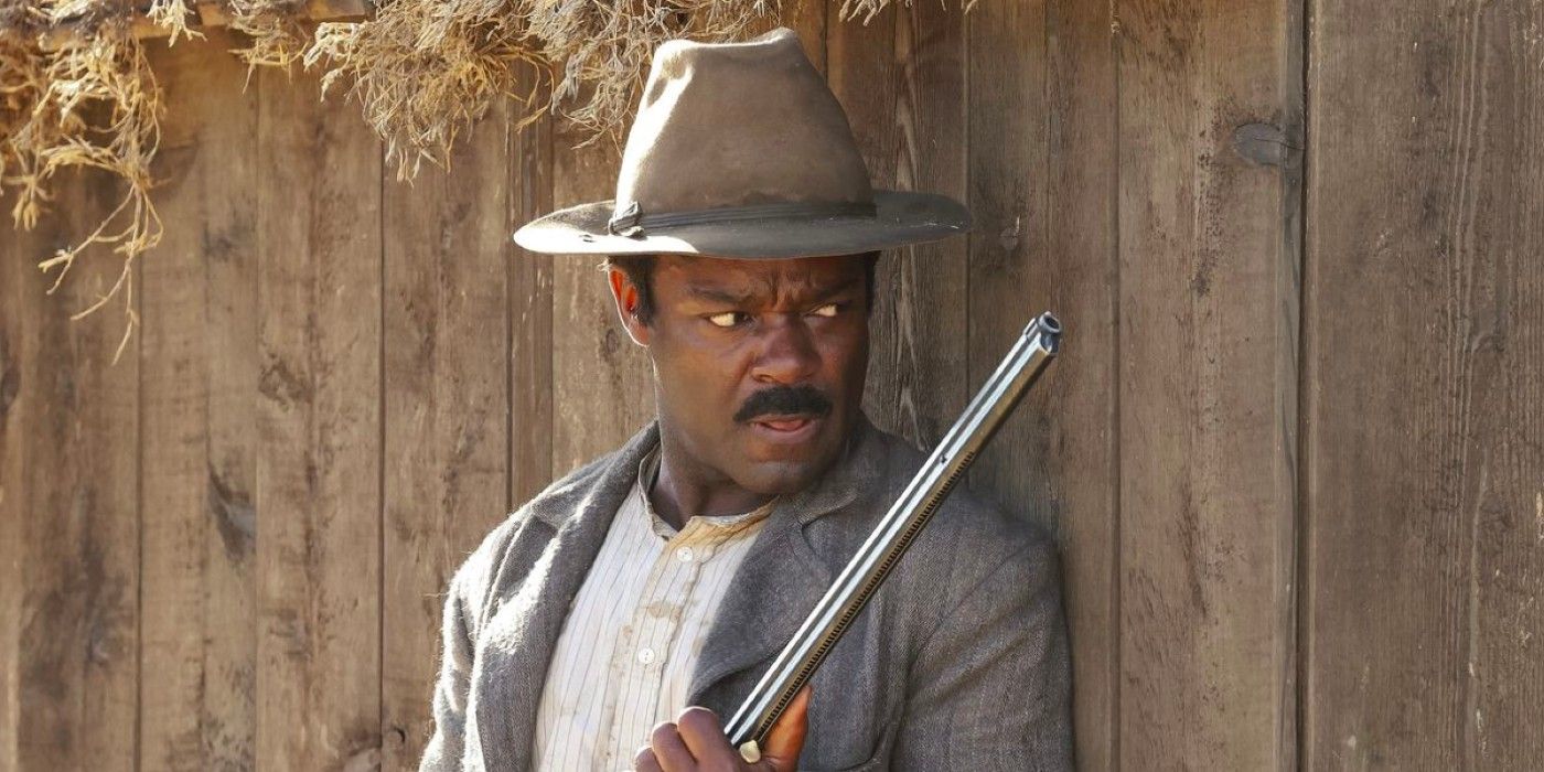 David Oyelowo as Bass Reeves holding a gun in Lawmen: Bass Reeves