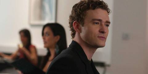 Sean Parker (Justin Timberlake) with a thin smile in The Social Network