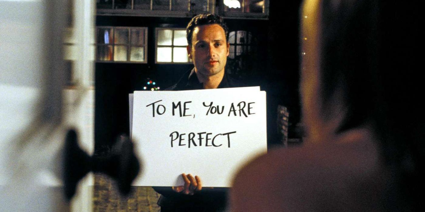Andrew Lincoln holds a sign in Love Actually
