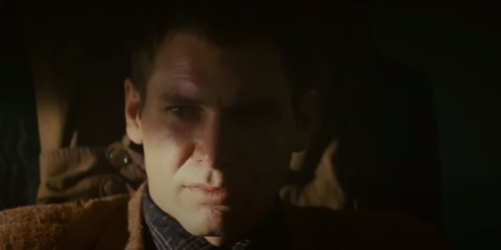 Harrison Ford looking sad as Rick Deckard in Blade Runner