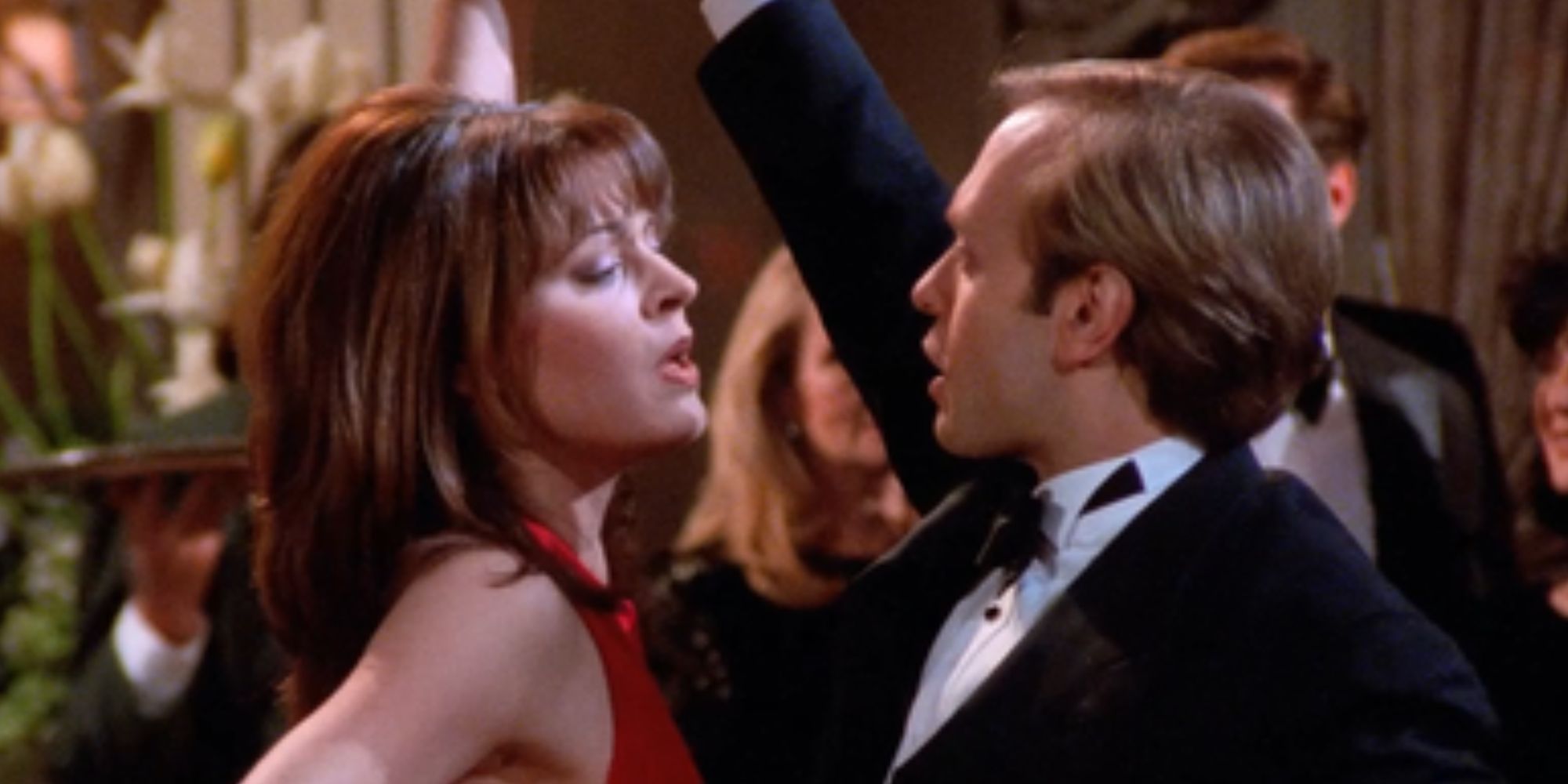 Jane Leeves as Daphne and David Hyde Pierce as Niles dancing in Frasier