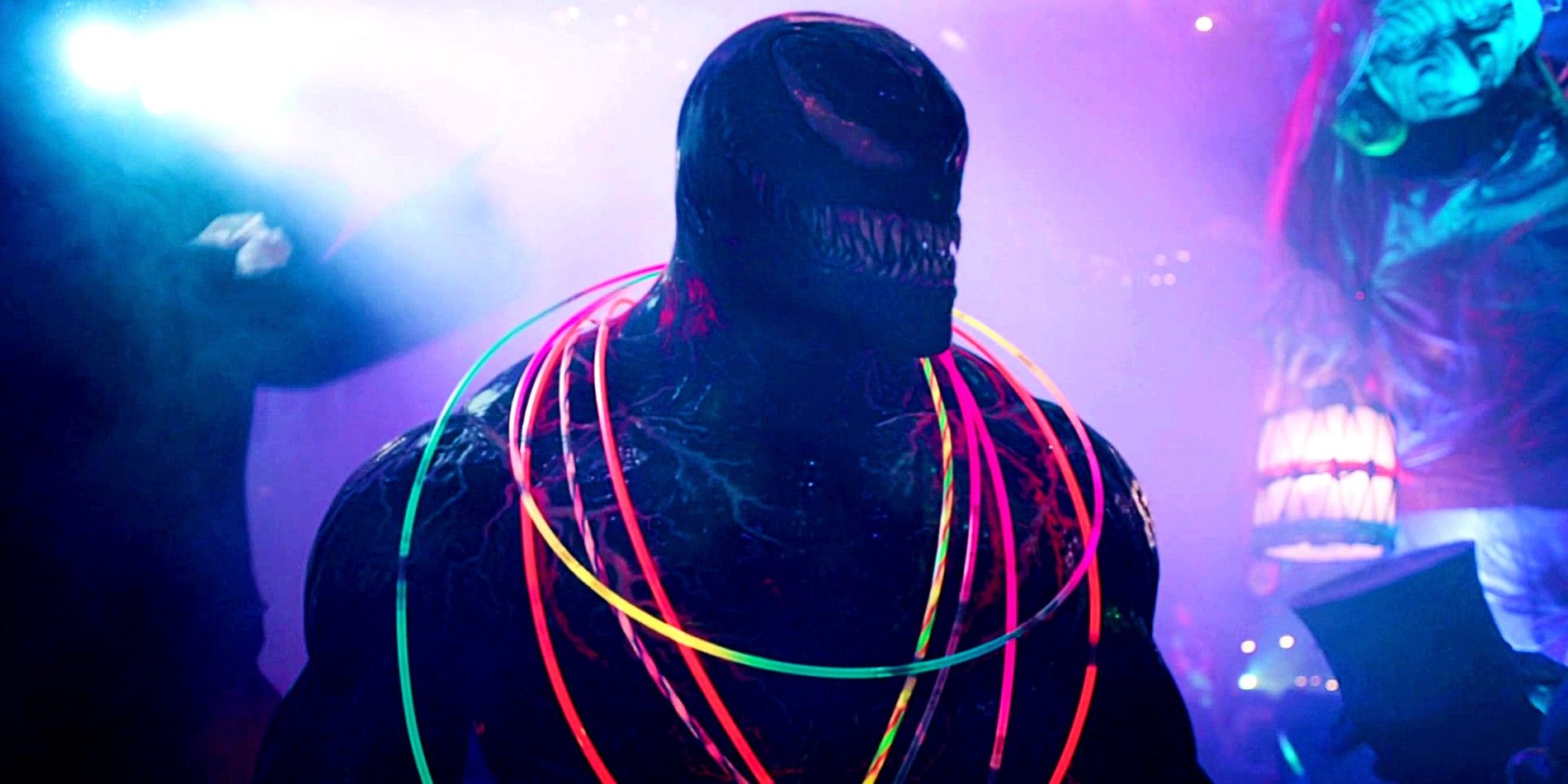 Venom With Glowstick Necklaces In A Club In Venom Let There Be Carnage