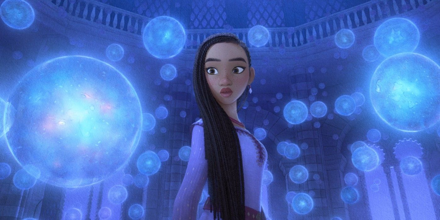 Asha looks at glowing orbs coming down around her in Disney's Wish.