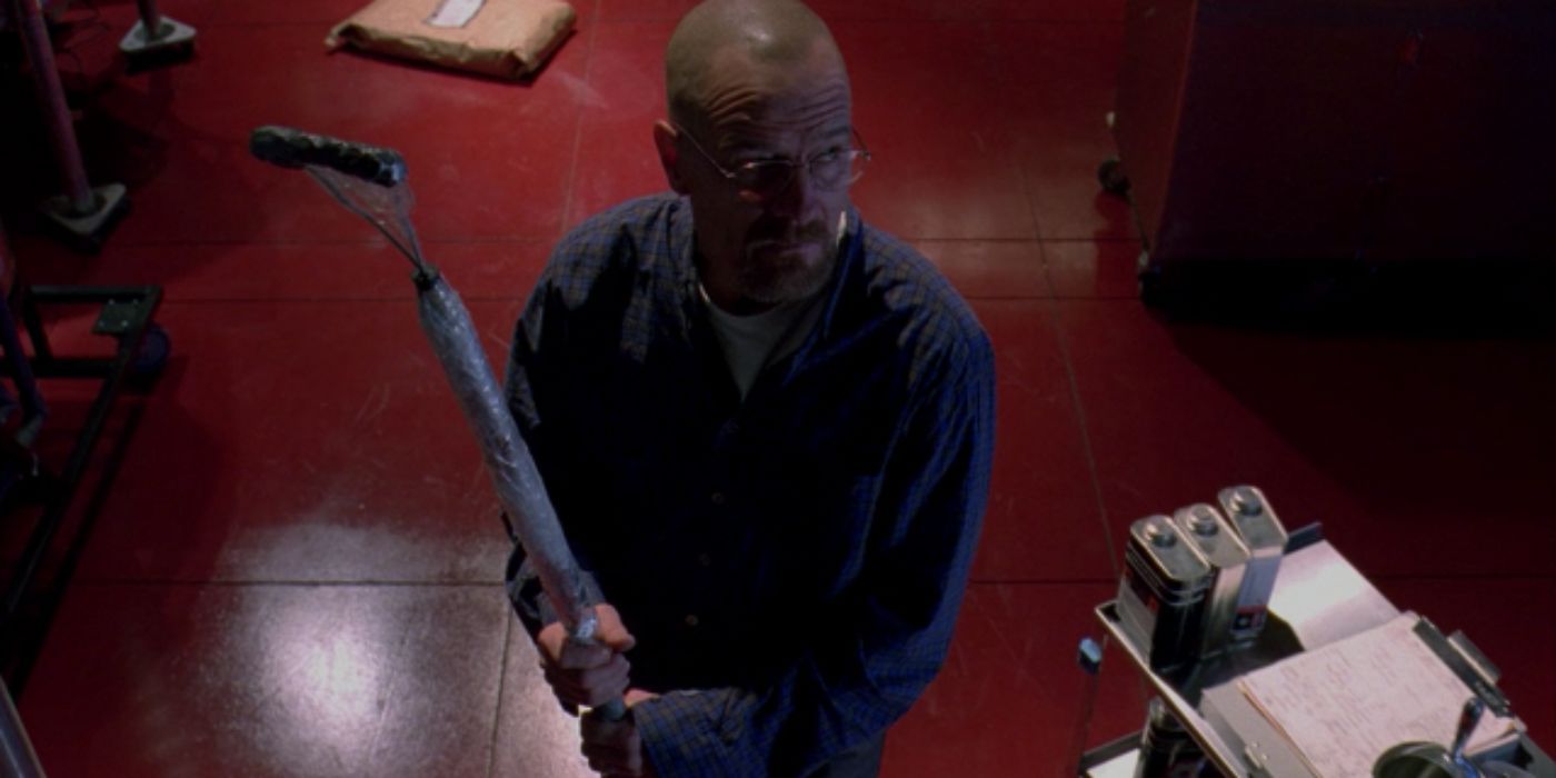 Walt holding a tool in the lab in Breaking Bad