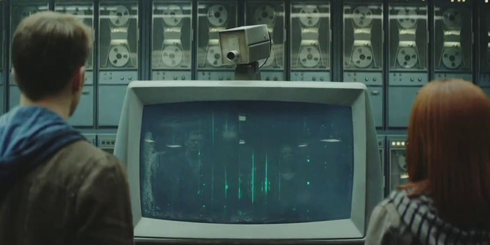 Steve Rogers and Natasha Romanoff looks at a Hydra computer in Captain America: The Winter Soldier